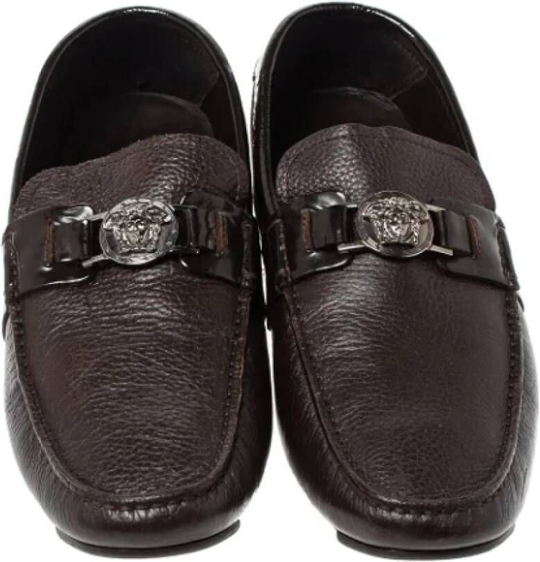 Versace Pre-owned Leather flats Brown Dames