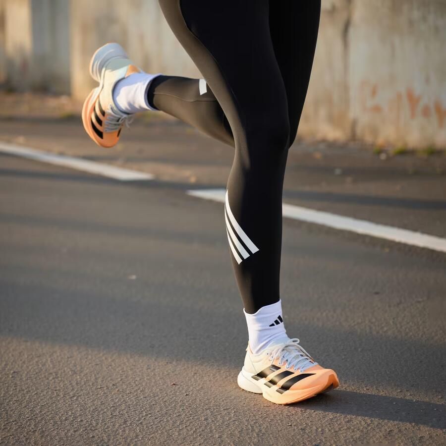 Adidas Women's Adizero Adios Pro 4 Hardloopschoenen 1 3 oranje wit - Foto 4