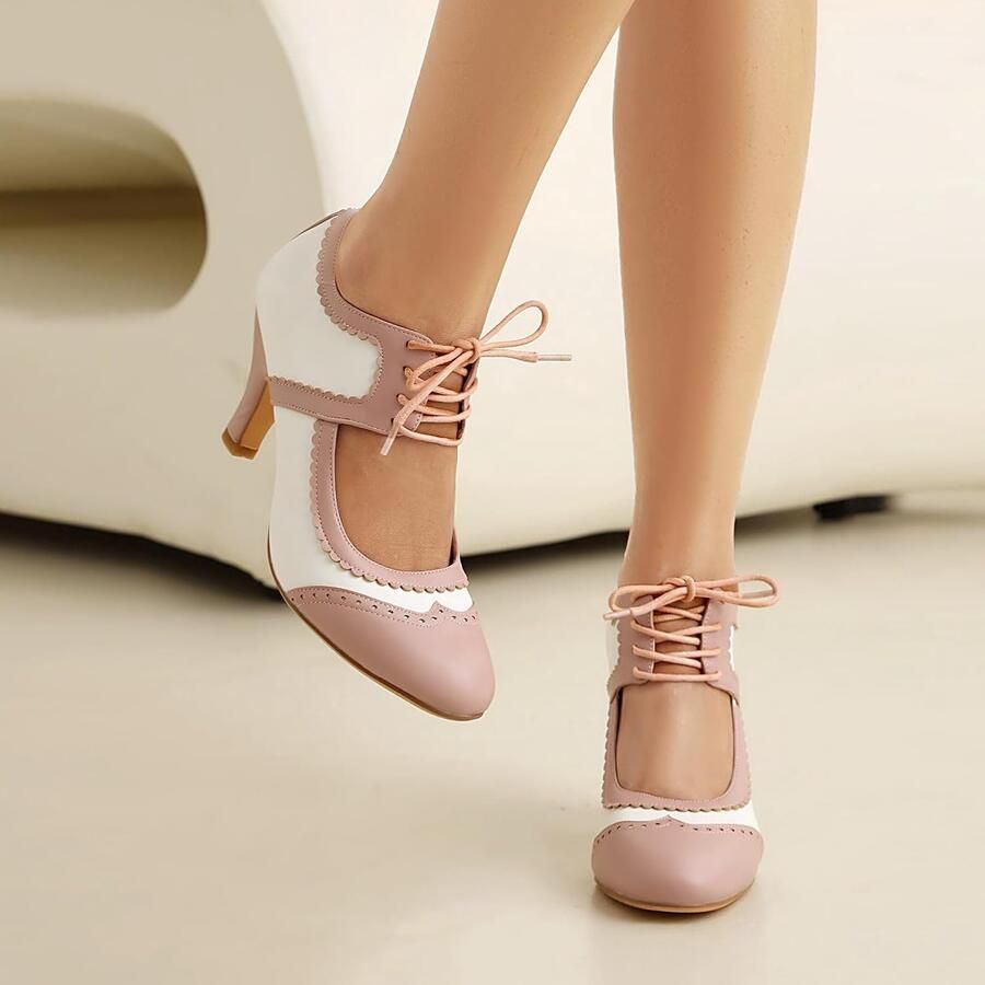Pumps met gesloten neus en strik retro stijl - Foto 1