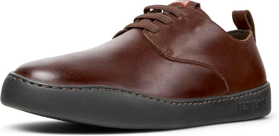 Sportieve herensneakers met uniek rond design