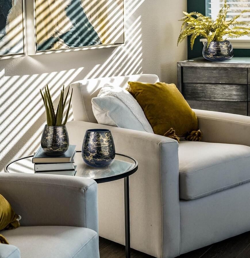 Vaas mondgeblazen zwart glas luxe uitstraling stijlvol en elegant hoog marmerlook bloemenvaas