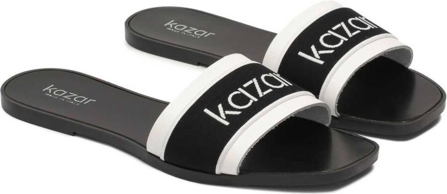 Kazar Black and white mules on a flat sole