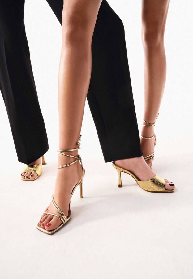 Kazar Elegant gold sandals with slender heels