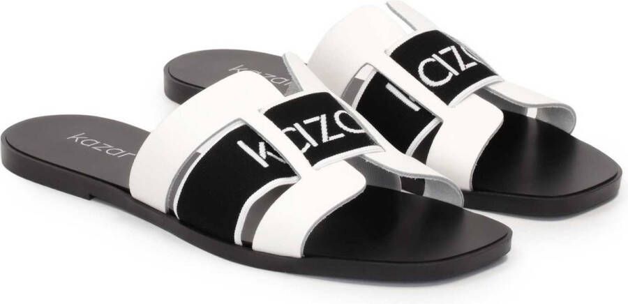 Kazar White and black mules on a flat sole