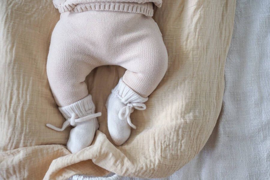 Rosinibabykinddesign Rosini sloffen merinowol ECRU