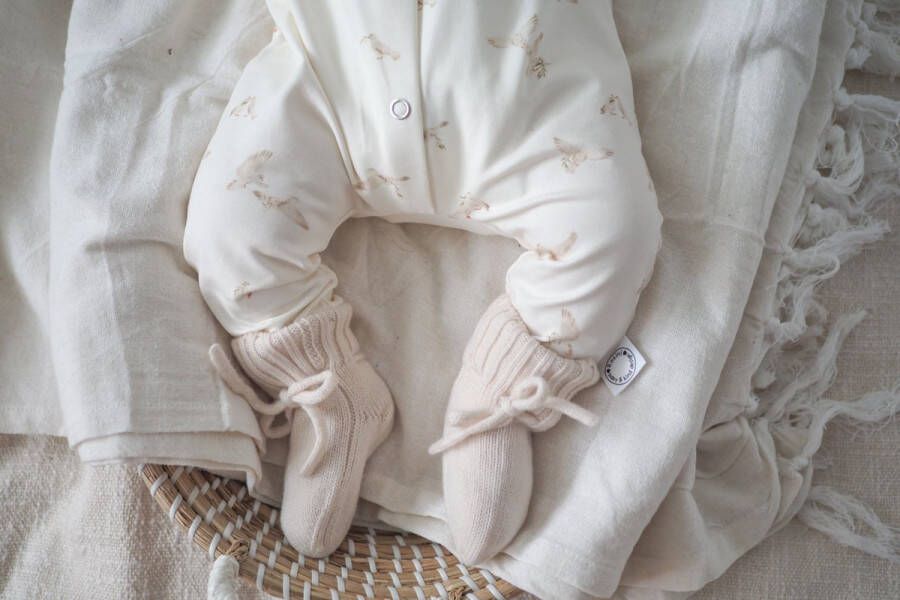 Rosinibabykinddesign Rosini sloffen merinowol ECRU