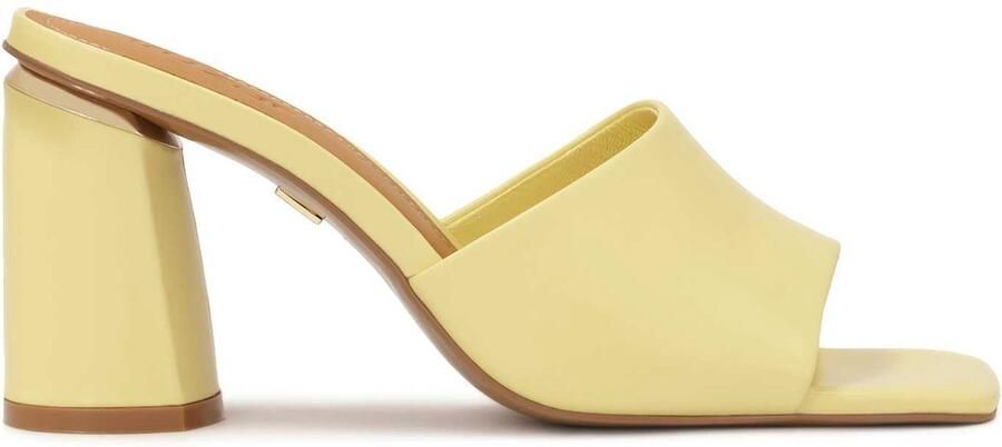 Kazar Yellow mules on a block