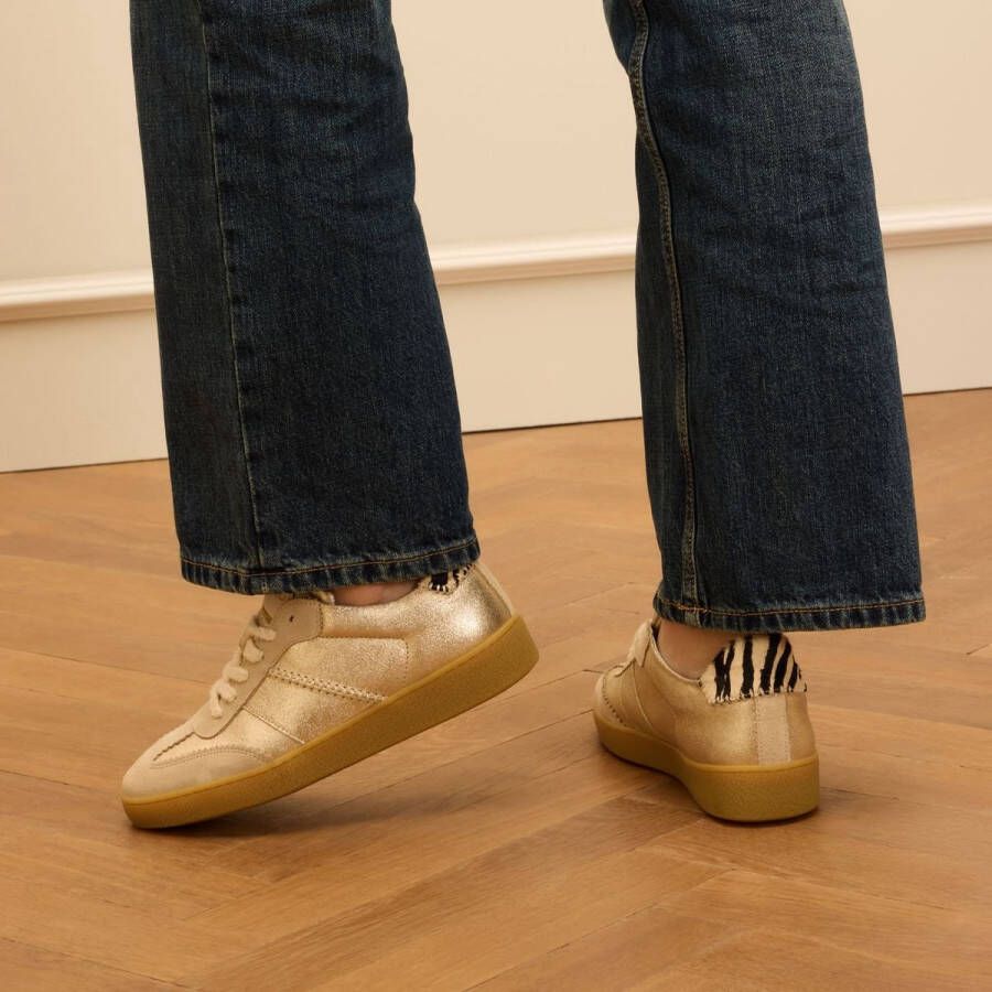 Manfield Dames Gouden leren sneakers met zebra details