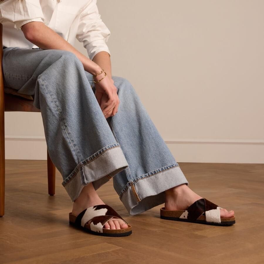 Manfield leren slippers met koeienprint wit bruin