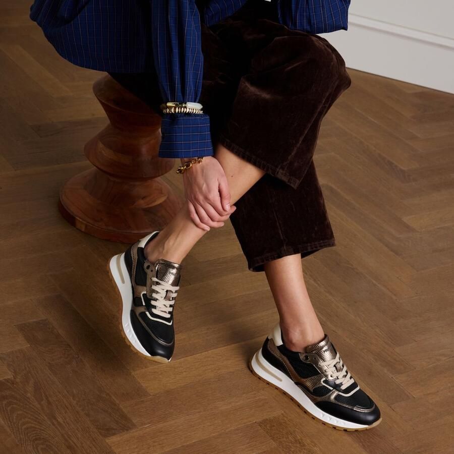 Manfield Dames Zwarte leren sneakers met metallic details