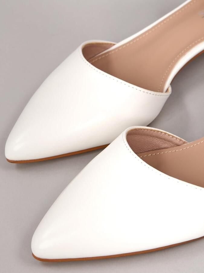 Pumps met riempjes hak zwart wit beige zacht suède-imitatie kunstleder