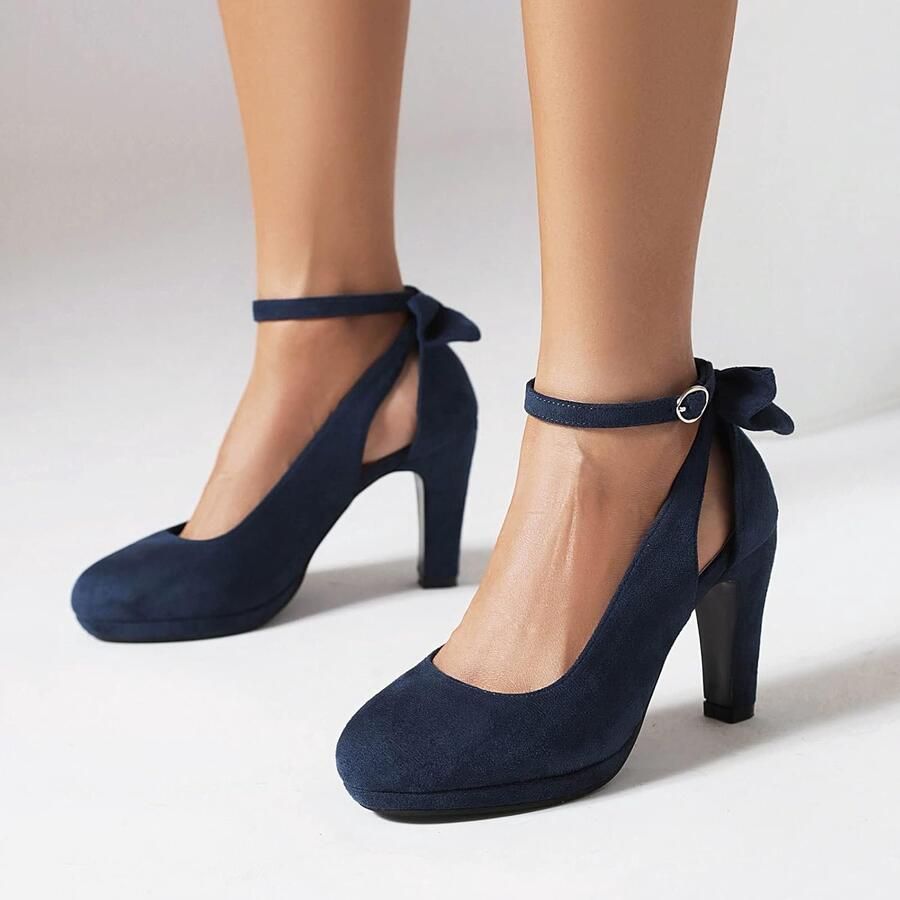 Pumps met strik ronde neus en enkelband