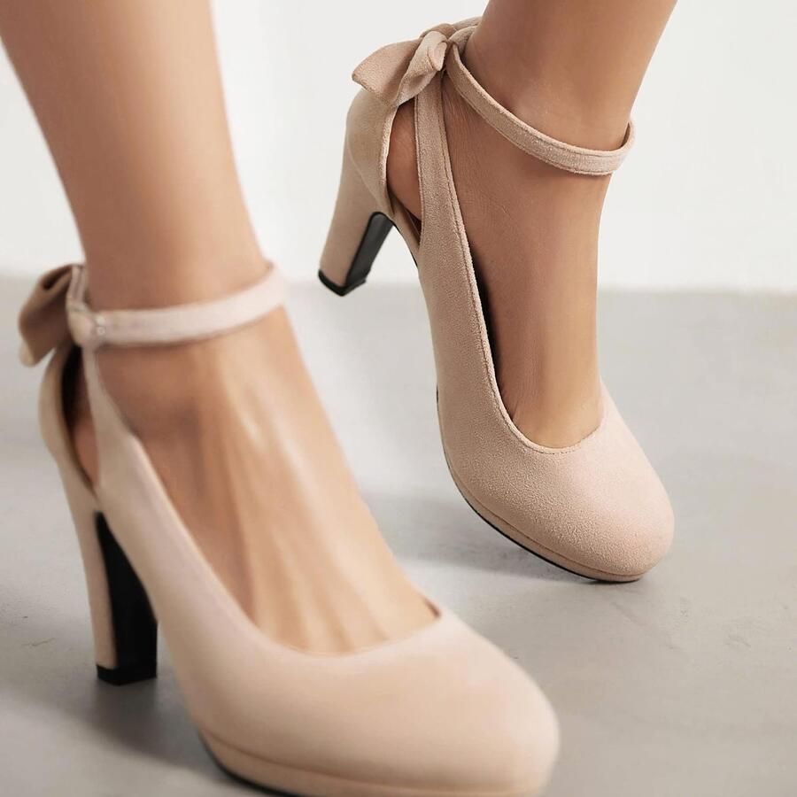 Pumps met strik ronde neus en enkelband