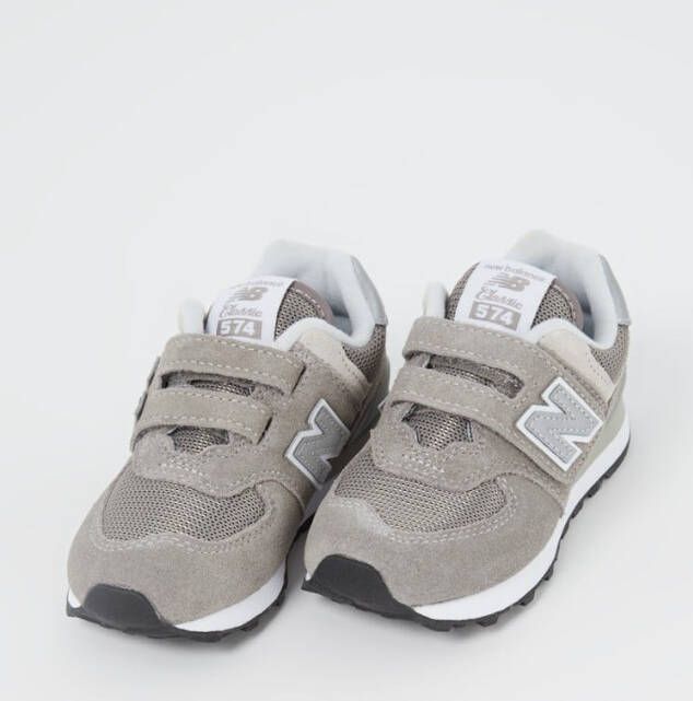 New Balance 574 sneaker van suède met mesh details