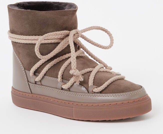 Inuikii Classic snowboot van schapenvacht met leren details