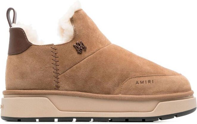AMIRI Malibu lammy enkellaarzen Beige
