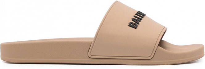 Balenciaga Slippers met logo-reliëf Beige