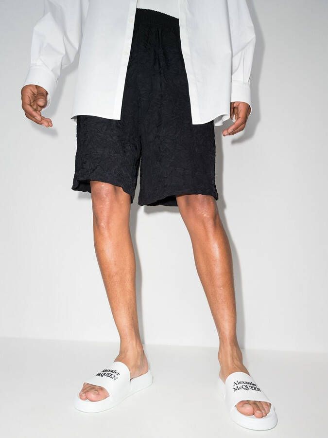 Alexander McQueen Slippers met logo-reliëf Wit