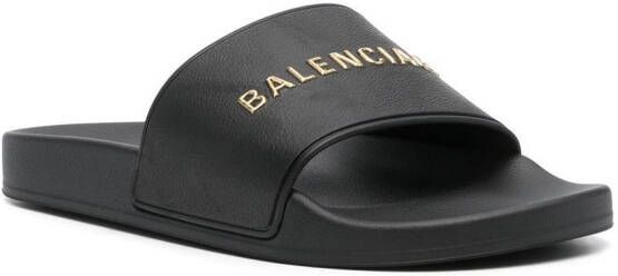 Balenciaga Badslippers met logoband Zwart