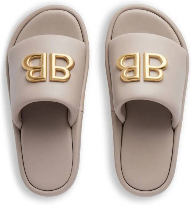 Balenciaga Rise slippers met logo Beige