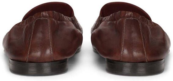 Dolce & Gabbana Slippers met logo reliëf Bruin