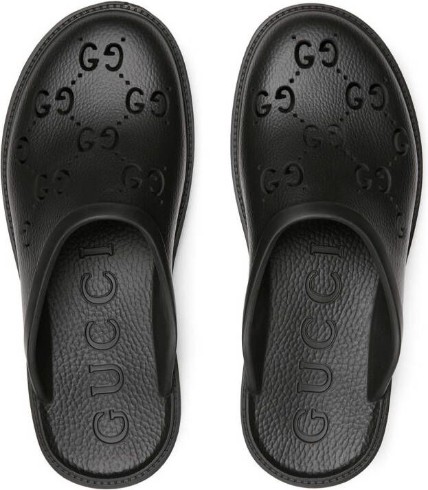 Gucci Slippers met print Zwart