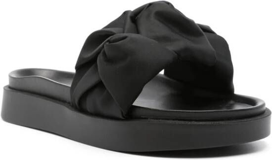 Inuikii Fjord Flower slippers Zwart