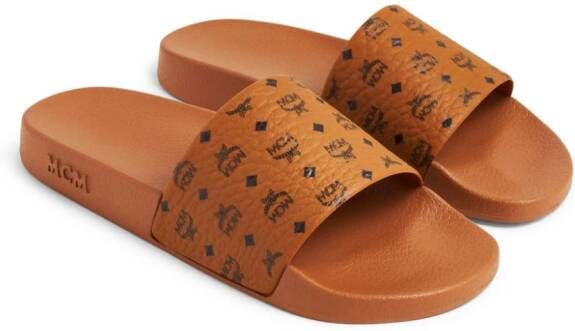 MCM Slippers met logo-reliëf Bruin