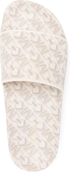 Michael Kors Gilmore slippers met monogram patroon Beige