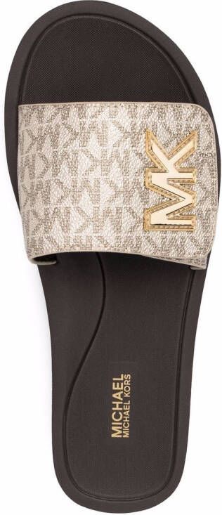 Michael Kors Slippers met monogramprint Goud