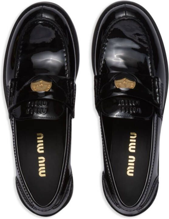 Miu Loafers met logoplakkaat Zwart