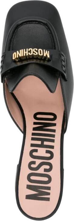Moschino Leren loafer muiltjes met logo Zwart