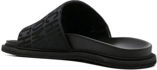 Moschino Slippers met logoprint Zwart