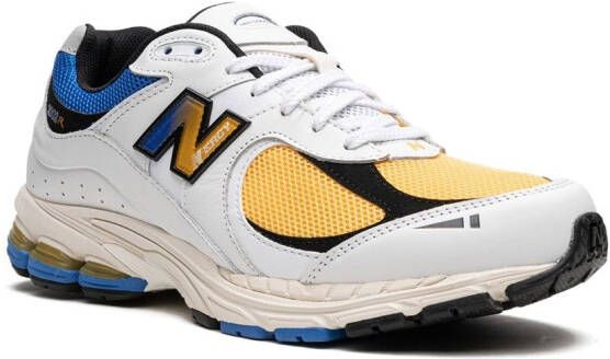 New Balance 2002R "Vibrant Apricot" sneakers Wit