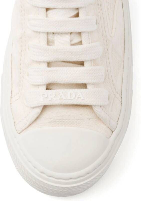 Prada Canvas sneakers met logo Beige