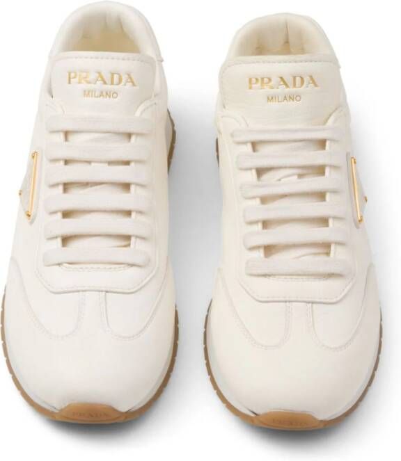 Prada Leren sneakers met logo Beige