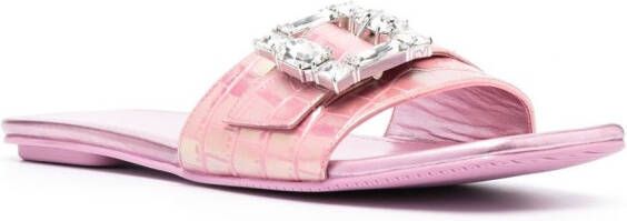 Stuart Weitzman Slippers met gespen Roze