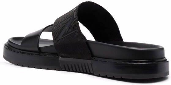 Valentino Garavani Slippers met logo reliëf Zwart