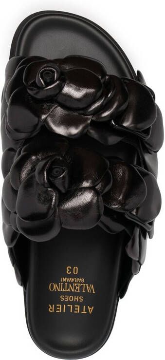 Valentino Garavani Slippers met roosdetail Zwart