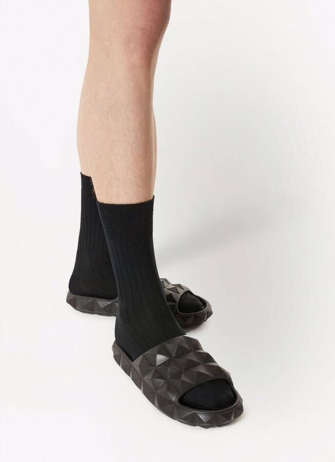 Valentino Garavani Roman Stud slippers met schildpaddetail Zwart