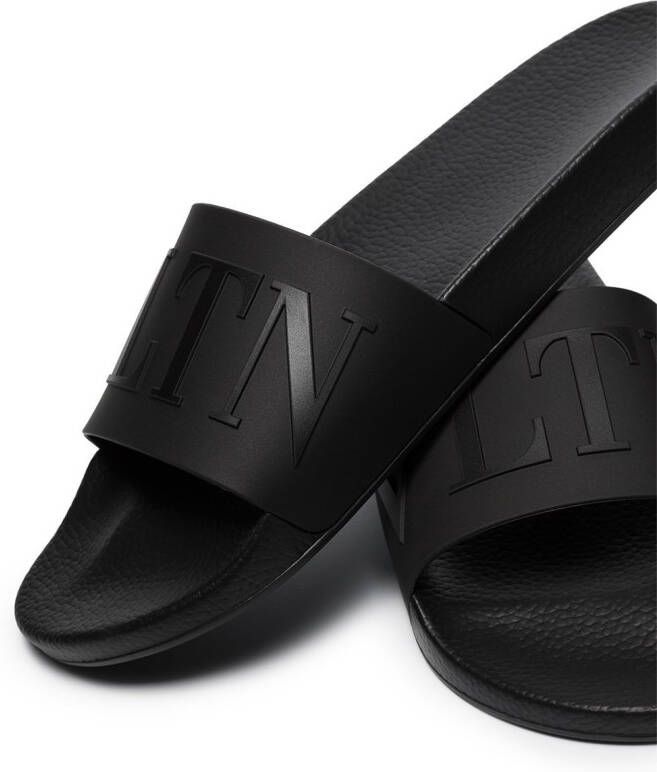 Valentino Garavani VLTN slippers met logo Zwart