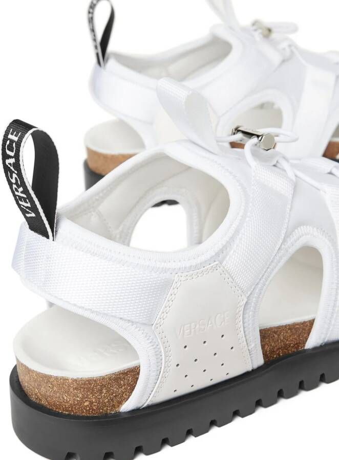 Versace Gekooide leren sandalen met vlakken Wit