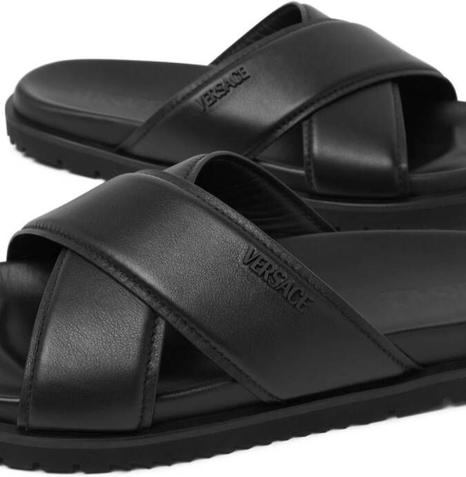 Versace Leren slippers met logo Zwart