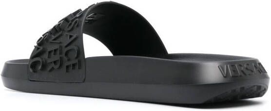 Versace Slippers met logoband Zwart