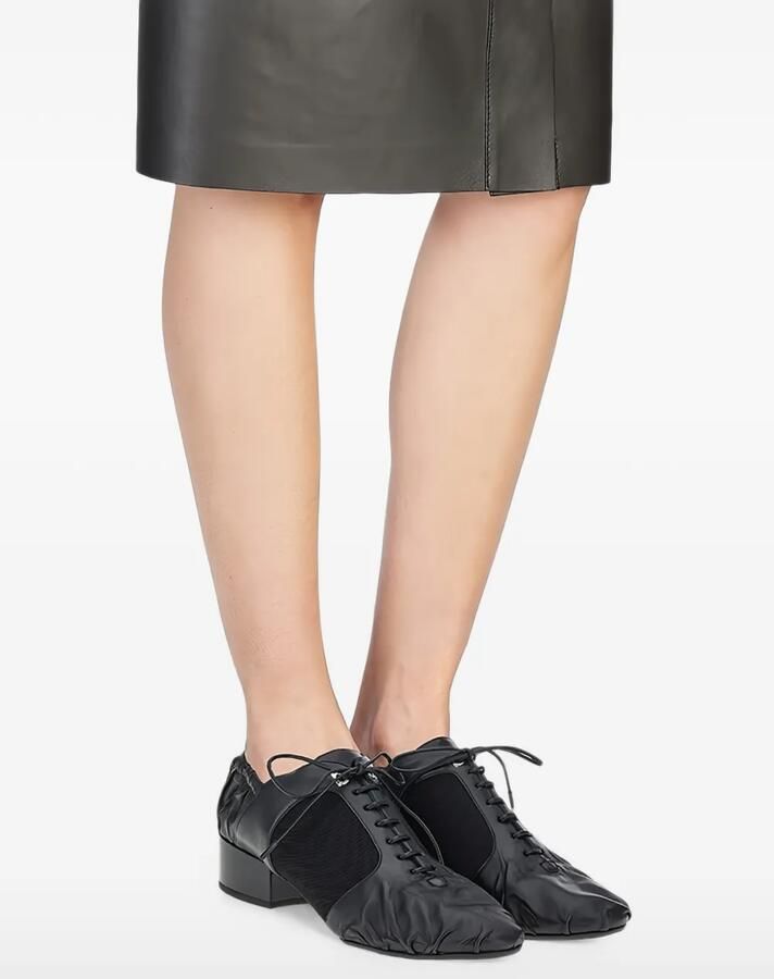 Ferragamo Gesmockte derby veterschoenen Zwart