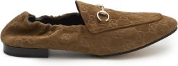 Gucci Leren loafers met logo-reliëf Bruin