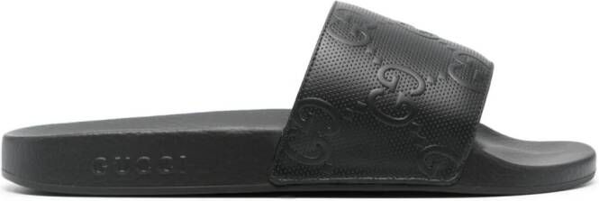 Gucci Slippers met GG reliëf Zwart