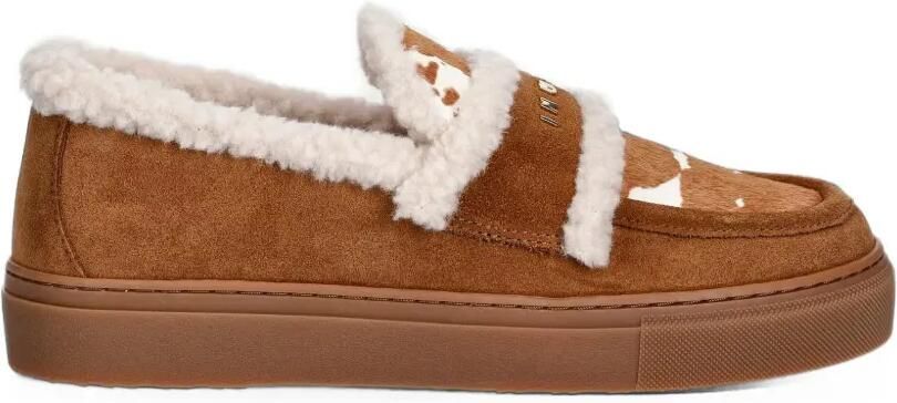 Inuikii Loafers met lammy afwerking en koeienprint Bruin