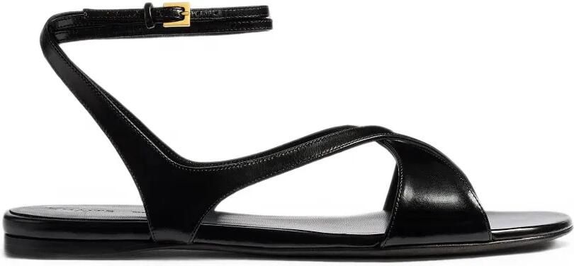 KHAITE Liria platte sandalen met enkelbandje Zwart