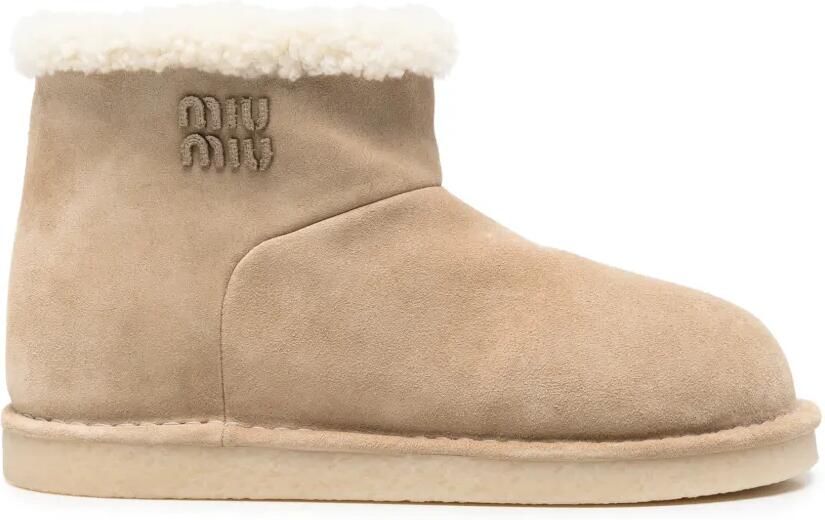 Miu Suède enkellaarzen met lammy afwerking Beige